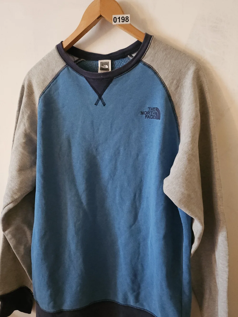 The North Face Blue Crewneck Sweatshirt with Gray Raglan Sleeves